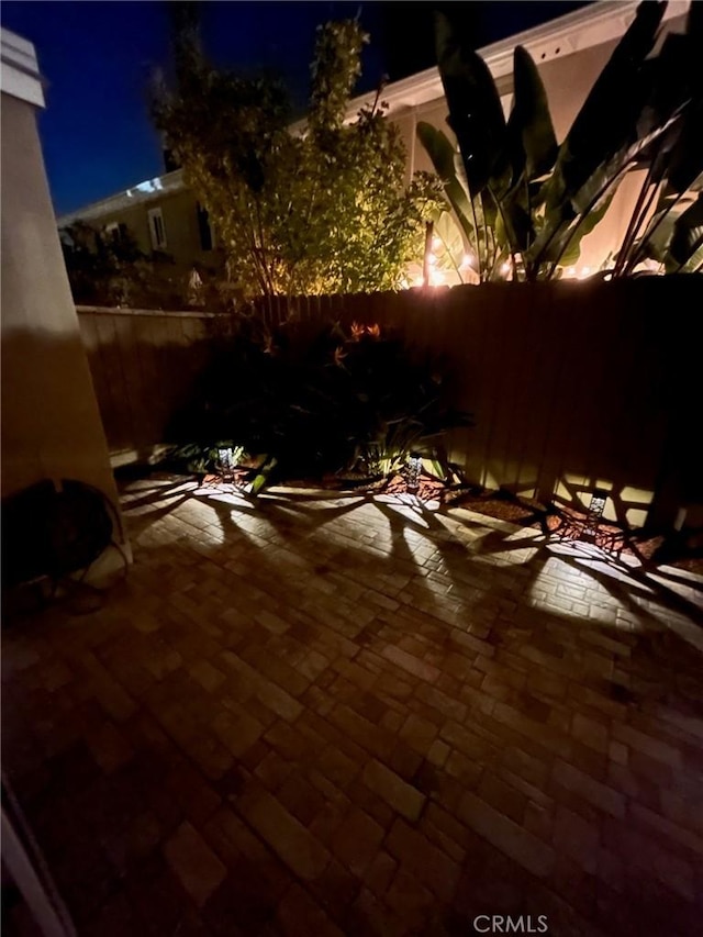 1741 Tustin Ave Unit 2A, Costa Mesa, CA 92627 - patio at twilight featuring a patio