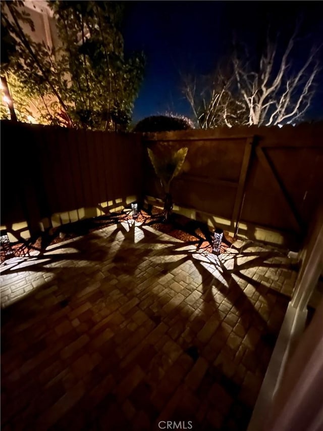 1741 Tustin Ave Unit 2A, Costa Mesa, CA 92627 - deck at night with a patio
