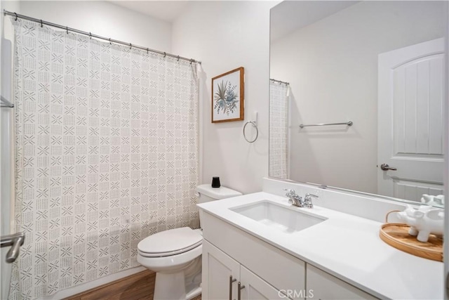 3615 Santa Monica Ct, Rosamond, CA 93560 - full bathroom featuring vanity and wood finished floors