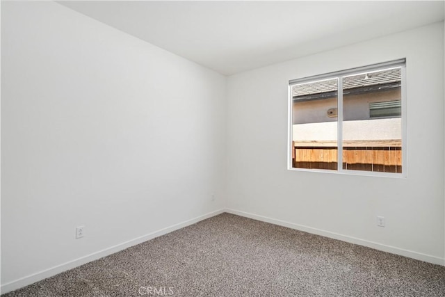 3615 Santa Monica Ct, Rosamond, CA 93560 - carpeted spare room featuring baseboards