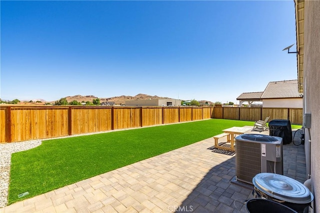 3615 Santa Monica Ct, Rosamond, CA 93560 - fenced backyard with a patio