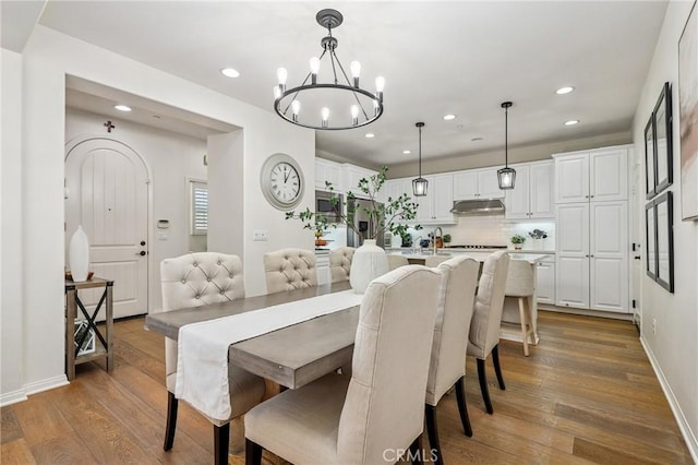410 N Tapia Ln, Brea, CA 92821 - dining room featuring recessed lighting, a chandelier, wood finished floors, and baseboards