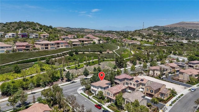 410 N Tapia Ln, Brea, CA 92821 - aerial view of property and surrounding area featuring nearby suburban area and a mountain backdrop