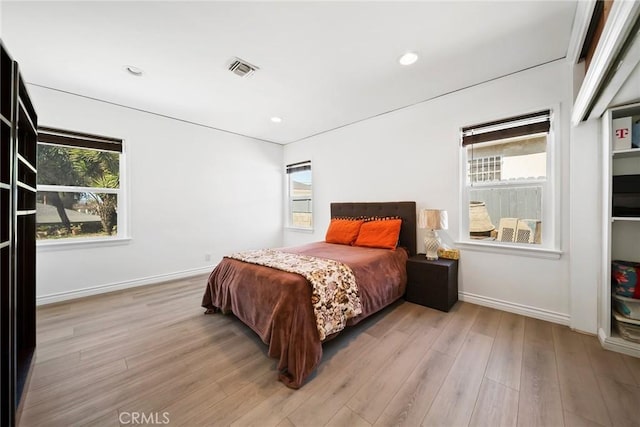 3549 S Cochran Ave, Los Angeles, CA 90016 - bedroom featuring light wood-type flooring, baseboards, and recessed lighting