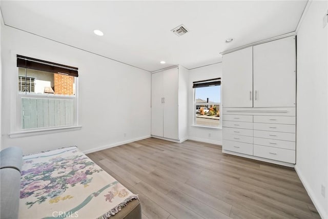 3549 S Cochran Ave, Los Angeles, CA 90016 - unfurnished bedroom featuring light wood-type flooring, baseboards, and recessed lighting