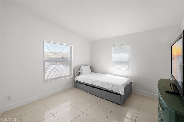 32955 Buckskin Rd, Temecula, CA 92592 - bedroom featuring multiple windows, vaulted ceiling, baseboards, and light tile patterned floors