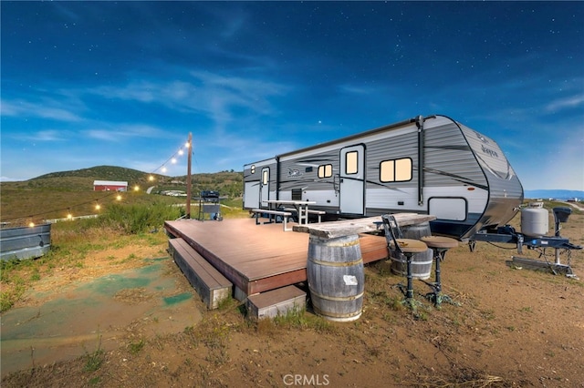 32955 Buckskin Rd, Temecula, CA 92592 - rear view of house with a deck with mountain view