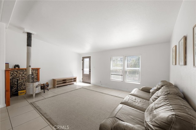 32955 Buckskin Rd, Temecula, CA 92592 - living area featuring light tile patterned floors and a wood stove