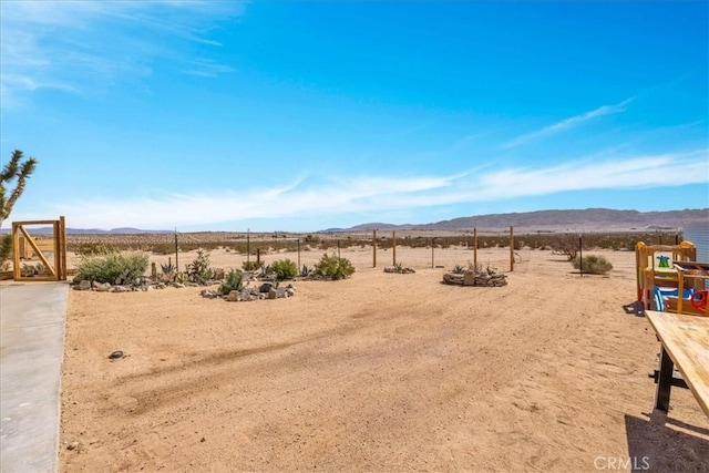 68365 Emerald Dr Unit 29, Palms, CA 92277 - view of yard featuring a mountain view, view of desert landscape, and a rural view
