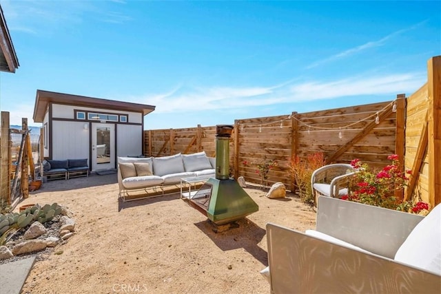 68365 Emerald Dr Unit 29, Palms, CA 92277 - fenced backyard featuring an outdoor hangout area and a patio