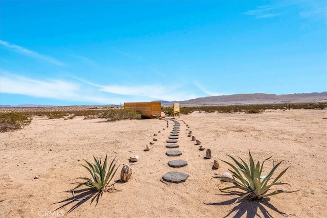 68365 Emerald Dr Unit 29, Palms, CA 92277 - view of yard featuring a desert view, a mountain view, and a rural view