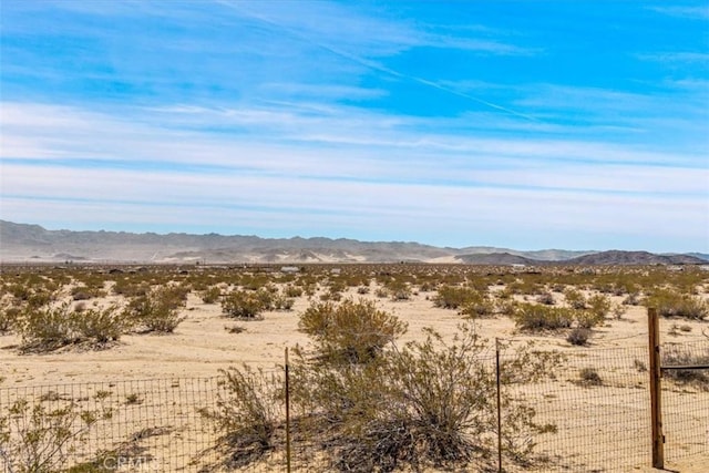 68365 Emerald Dr Unit 29, Palms, CA 92277 - view of mountain backdrop featuring a desert landscape and rural landscape