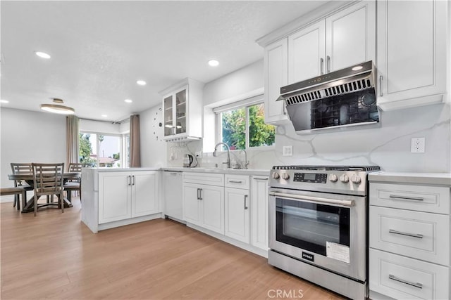 1931 El Sereno Ave, Arcadia, CA 91007 - kitchen featuring stainless steel gas range, dishwasher, range hood, a sink, and light countertops