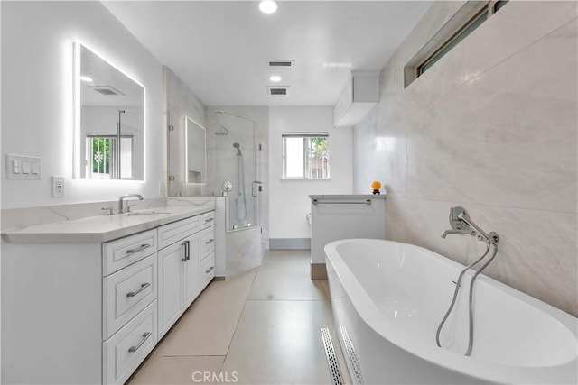 1931 El Sereno Ave, Arcadia, CA 91007 - full bath with a shower stall, vanity, a freestanding bath, recessed lighting, and tile patterned floors