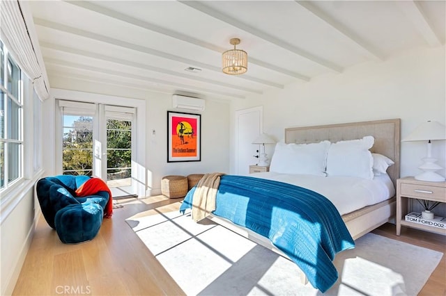 802 Rembrandt Dr, Laguna Beach, CA 92651 - bedroom with wood finished floors, a wall mounted AC, access to outside, beam ceiling, and a chandelier