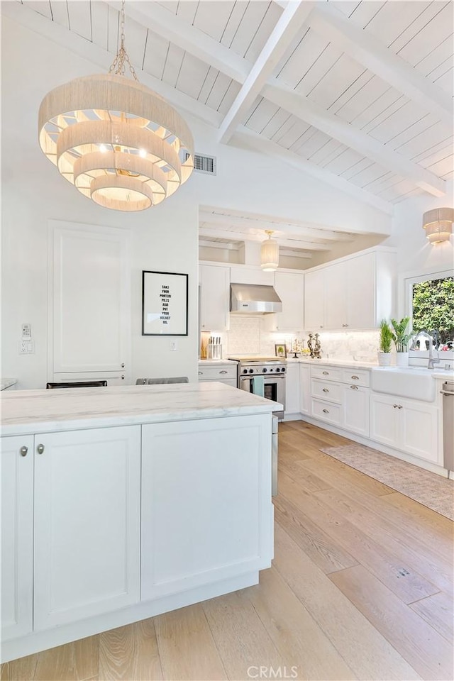 802 Rembrandt Dr, Laguna Beach, CA 92651 - kitchen featuring wall chimney range hood, electric stove, light wood-style floors, white cabinets, and decorative backsplash