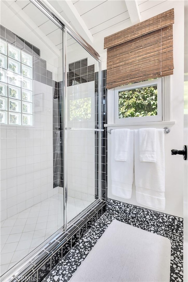 802 Rembrandt Dr, Laguna Beach, CA 92651 - bathroom featuring healthy amount of natural light, a stall shower, and beam ceiling