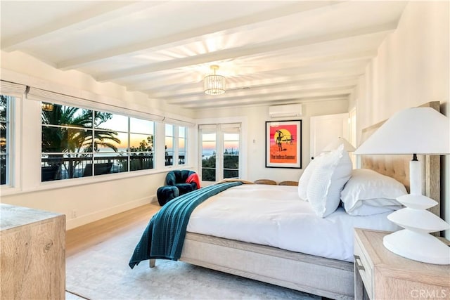 802 Rembrandt Dr, Laguna Beach, CA 92651 - bedroom featuring beamed ceiling, wood finished floors, a wall mounted air conditioner, and baseboards
