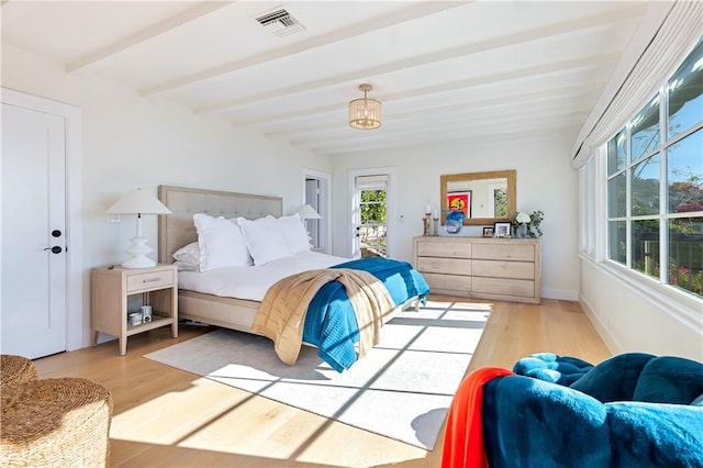 802 Rembrandt Dr, Laguna Beach, CA 92651 - bedroom with beam ceiling, wood finished floors, access to exterior, and baseboards