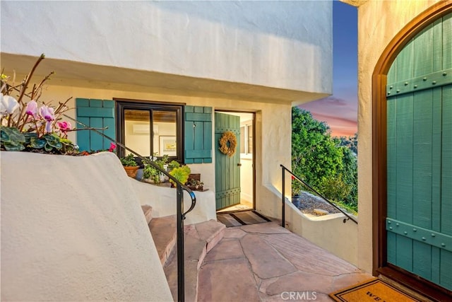 802 Rembrandt Dr, Laguna Beach, CA 92651 - exterior entry at dusk featuring stucco siding