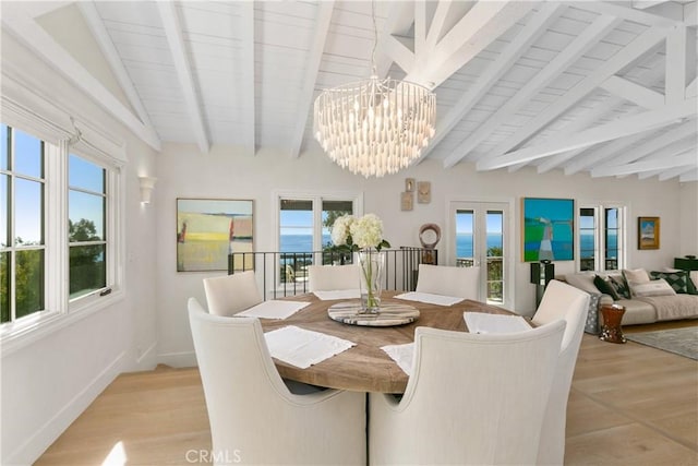 802 Rembrandt Dr, Laguna Beach, CA 92651 - dining room with a chandelier, plenty of natural light, wooden ceiling, and light wood-style floors