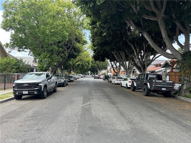 1212 E 54th St, Los Angeles, CA 90011 - view of asphalt street featuring curbs