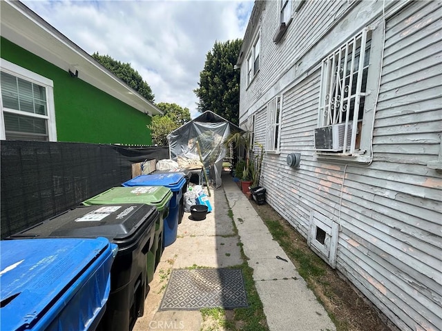 1212 E 54th St, Los Angeles, CA 90011 - view of property exterior featuring cooling unit