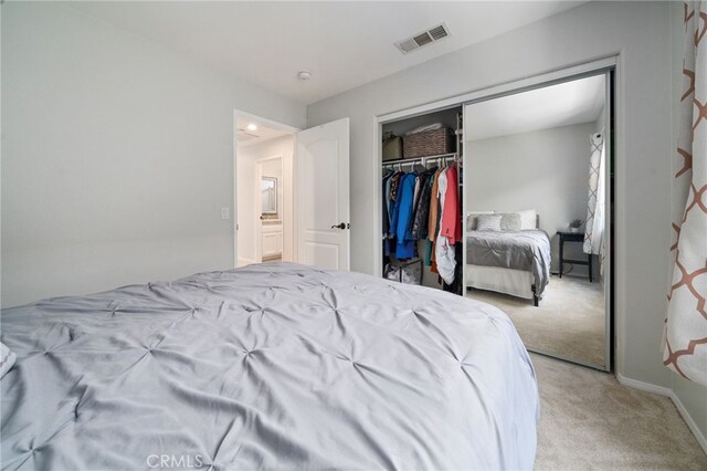 16741 Tim Ln, Van Nuys, CA 91406 - bedroom with light colored carpet, a closet, and baseboards