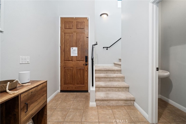 16741 Tim Ln, Van Nuys, CA 91406 - entryway featuring baseboards, stairway, and light tile patterned floors