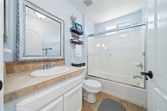 16741 Tim Ln, Van Nuys, CA 91406 - bathroom with vanity, toilet, bath / shower combo with glass door, and tile patterned flooring