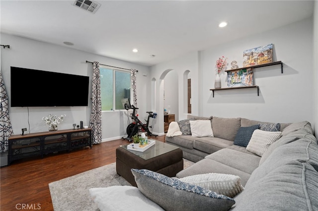 16741 Tim Ln, Van Nuys, CA 91406 - living room with arched walkways, wood finished floors, recessed lighting, and baseboards