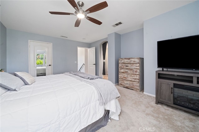 16741 Tim Ln, Van Nuys, CA 91406 - bedroom with light colored carpet, ceiling fan, and baseboards