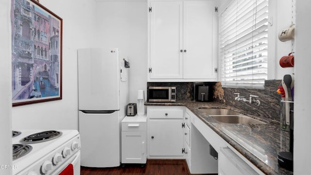 128 Lime Ave Unit 14, Long Beach, CA 90802 - kitchen with white appliances, a sink, white cabinets, tasteful backsplash, and dark wood finished floors
