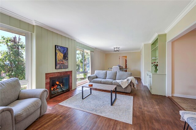 1200 N Cypress St, La Habra Heights, CA 90631 - living area featuring crown molding, wood finished floors, a brick fireplace, and baseboards