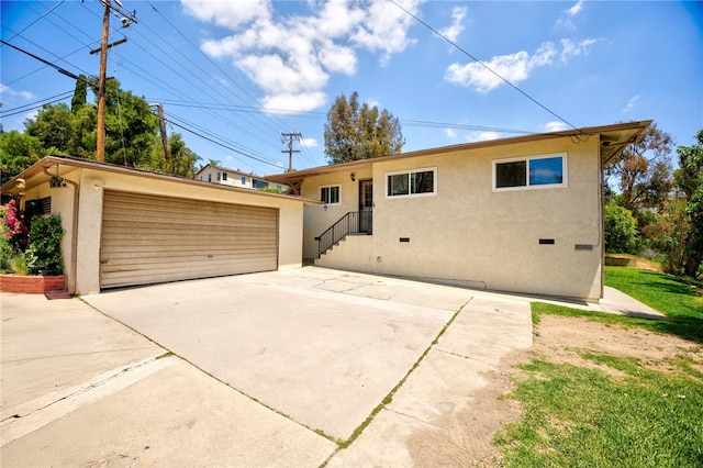 1200 N Cypress St, La Habra Heights, CA 90631 - view of front facade featuring stucco siding, an outbuilding, and crawl space