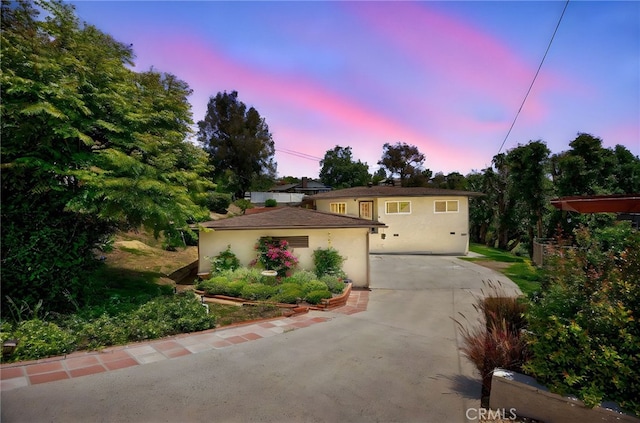 1200 N Cypress St, La Habra Heights, CA 90631 - ranch-style house with stucco siding and driveway