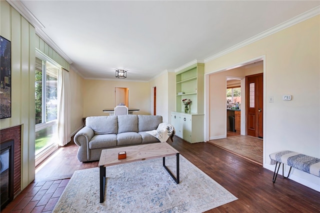 1200 N Cypress St, La Habra Heights, CA 90631 - living area featuring healthy amount of natural light, ornamental molding, a fireplace, dark wood-style flooring, and baseboards
