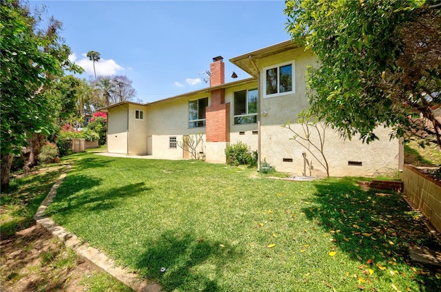 1200 N Cypress St, La Habra Heights, CA 90631 - rear view of property with stucco siding, a chimney, and crawl space