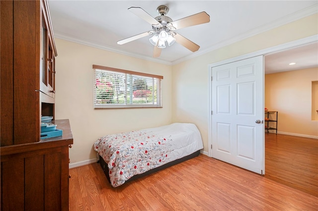 1200 N Cypress St, La Habra Heights, CA 90631 - bedroom with light wood-style floors, baseboards, ornamental molding, and ceiling fan