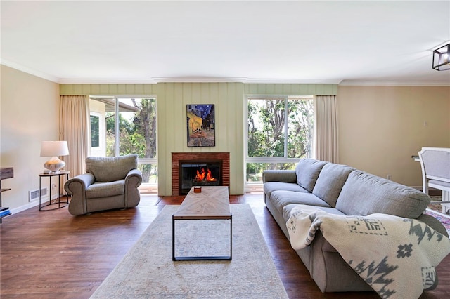 1200 N Cypress St, La Habra Heights, CA 90631 - living room featuring wood finished floors, crown molding, plenty of natural light, a brick fireplace, and baseboards