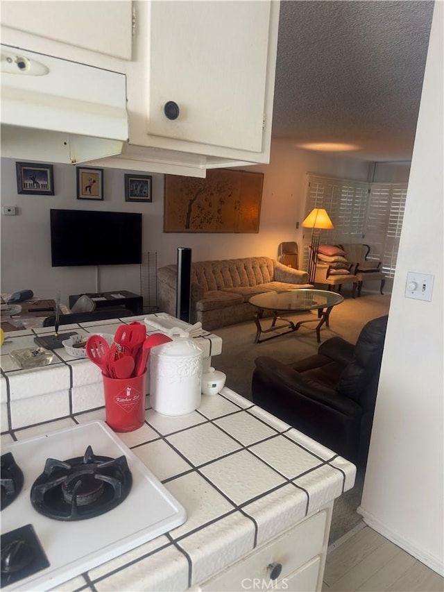 3749 Lockland Dr Unit B, Los Angeles, CA 90008 - living room with a textured ceiling and light wood-style floors