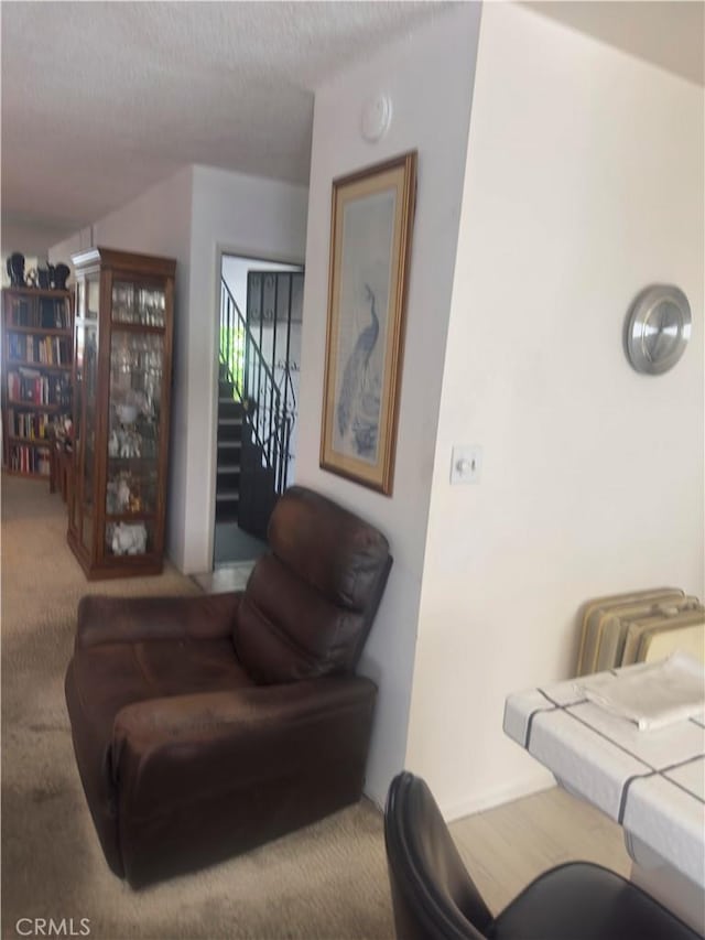 3749 Lockland Dr Unit B, Los Angeles, CA 90008 - living area with carpet floors and stairs