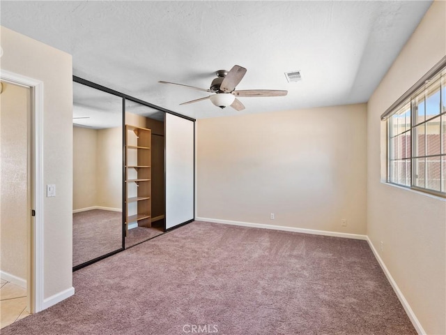 17970 Pitache St, Hesperia, CA 92345 - unfurnished bedroom featuring carpet floors, baseboards, and a ceiling fan