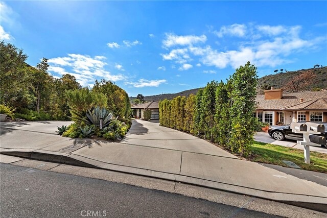 31751 E Nine, Laguna Niguel, CA 92677 - view of property hidden behind natural elements featuring a mountain view