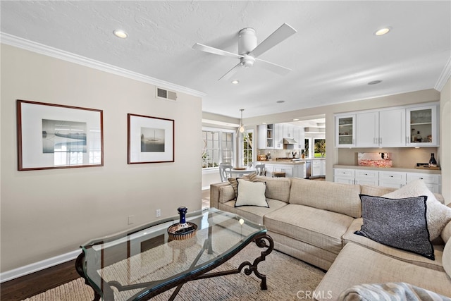 31751 E Nine, Laguna Niguel, CA 92677 - living room with baseboards, wood finished floors, recessed lighting, ornamental molding, and a ceiling fan