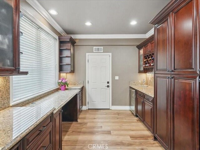 27718 Heartwood Ct, Valencia, CA 91354 - laundry room with light wood-style flooring, ornamental molding, a bar, baseboards, and recessed lighting