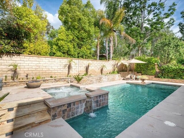 27718 Heartwood Ct, Valencia, CA 91354 - view of swimming pool with a pool with connected hot tub