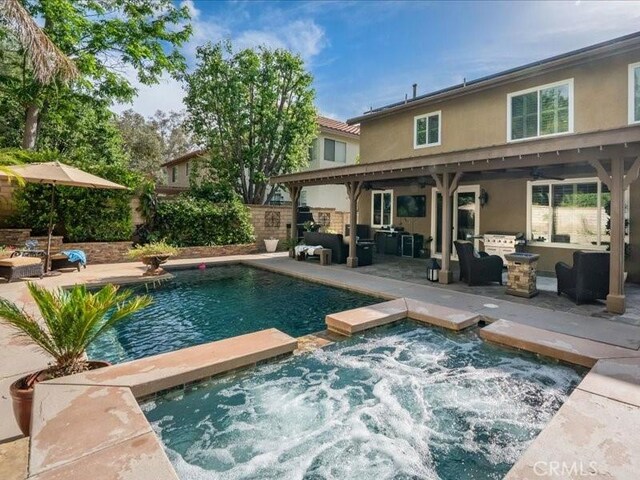 27718 Heartwood Ct, Valencia, CA 91354 - view of pool with an in-ground hot tub, outdoor lounge area, and a patio area