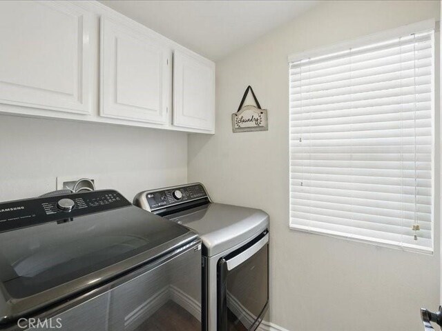27718 Heartwood Ct, Valencia, CA 91354 - laundry room with washing machine and dryer and cabinet space