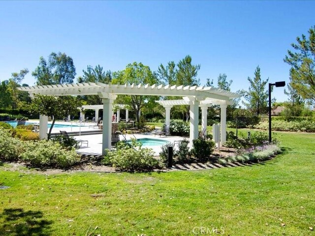 27718 Heartwood Ct, Valencia, CA 91354 - view of home's community featuring a pergola, a lawn, a swimming pool, and a patio